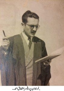 Young Professor Ashfaq Ahmed holding a paper and pencil